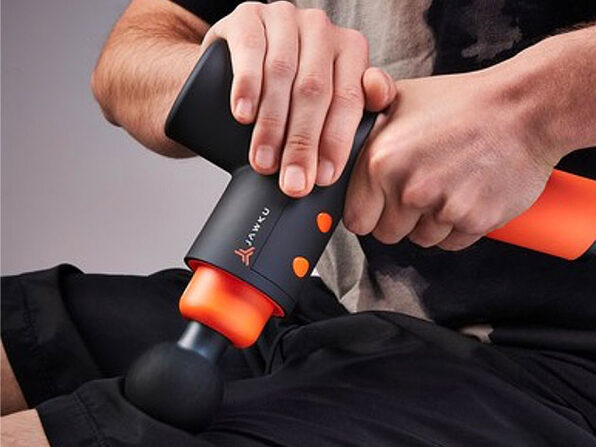 A person using a JAWKU massager