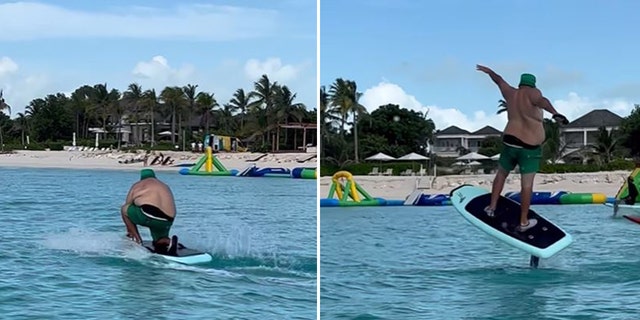 DJ Khaled wears green shorts while surfing in Turks and Caicos